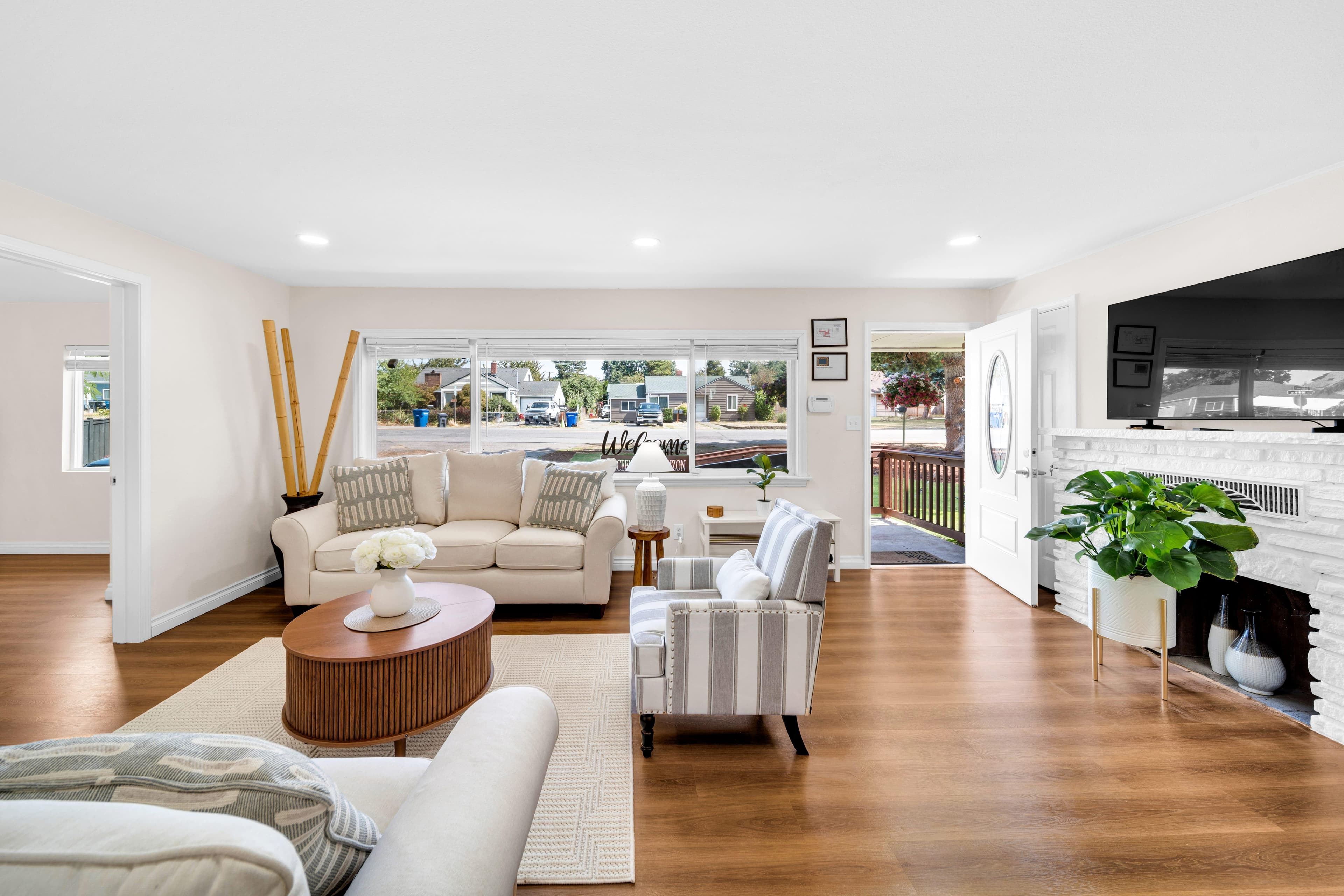 Sunrise Gardens AFH exterior with beautiful garden